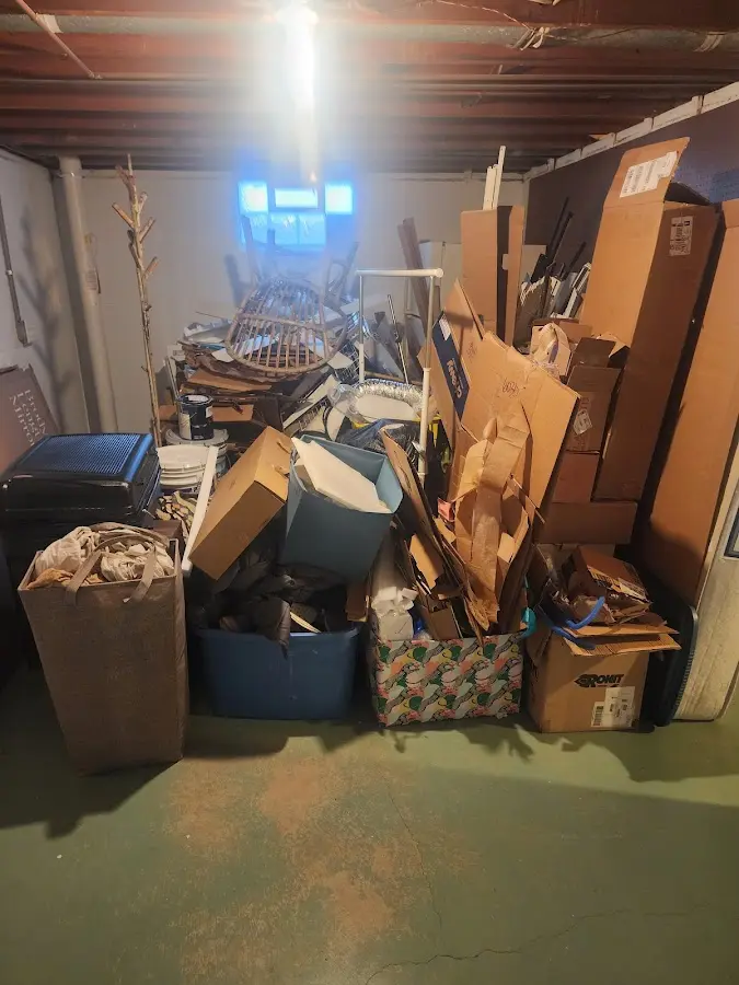 Roll-off dumpster container at job site for 20 Yard Dumpster Rental in Bronxville